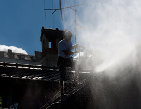 how to power wash a house